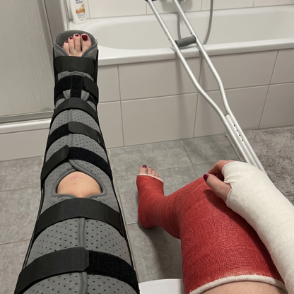 LLC Brace with red SLC short leg cast - dual cast roleplay setup for Castlife cast fetish community